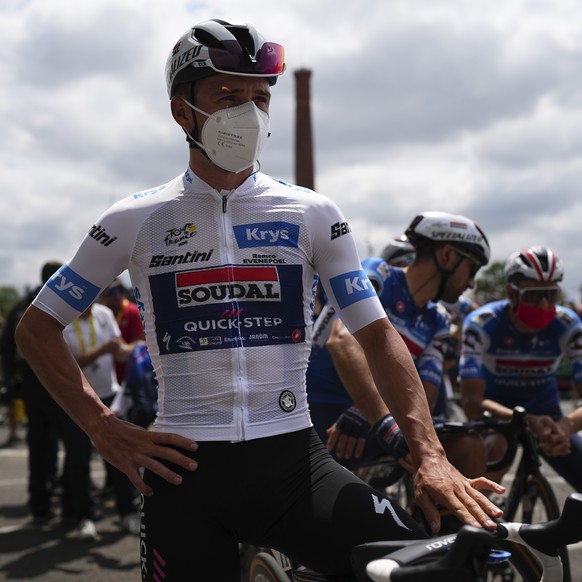 Belgium&#039;s Remco Evenepoel, wearing the best young rider&#039;s white jersey, wears a face mask to protect himself from the Corona virus prior to the start of the fourteenth stage of the Tour de F ...
