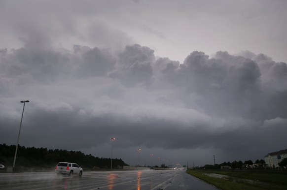 epa06194306 A rain squall line moves over the southern edge of the Florida peninsula as conditions deteriorate from Hurricane Irma in Homestead, Florida, USA, 09 September 2017. Many areas are under m ...