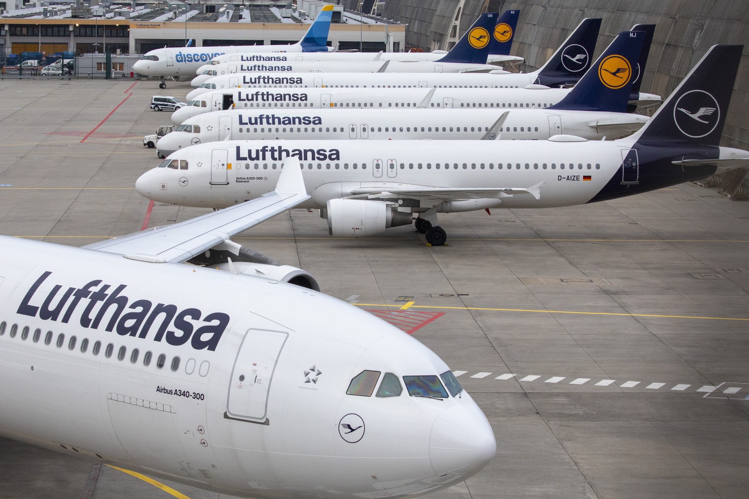 epa11215797 Lufthansa planes are seen stationed, at Frankfurt Airport, in Frankfurt am Main, Germany, 12 March 2024. The UFO cabin crew union has called on its members to strike, to press their demand ...