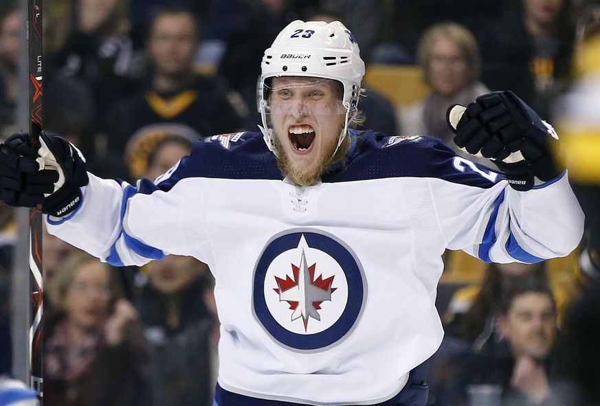 Winnipeg Jets&#039; Patrik Laine, of Finland, celebrates his goal during the third period of an NHL hockey game against the Boston Bruins in Boston, Thursday, Dec. 21, 2017. The Bruins won 2-1 in a sh ...