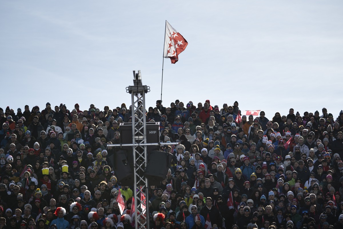 The crowd observed a minute's silence for the victims of the bar fire on New Year's Eve before the men's Downhill race at the Alpine Skiing FIS Ski World Cup, in Crans-Montana, Switzerl ...