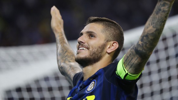 Inter Milan&#039;s Mauro Icardi celebrates after scoring during the Serie A soccer match between Inter Milan and Juventus at the San Siro stadium in Milan, Italy, Sunday, Sept. 18, 2016. (AP Photo/Ant ...