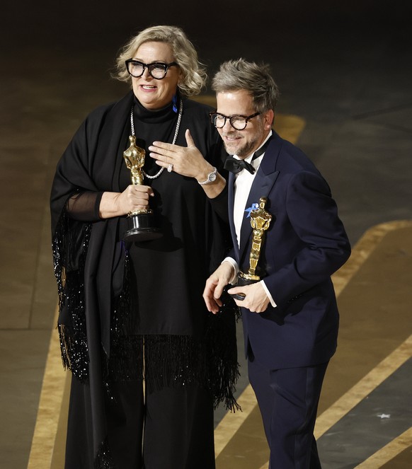 epa10518837 Ernestine Hipper and Christian M. Goldbeck after winning the Oscar for Best Production Design for 