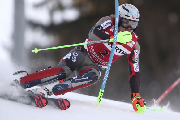 Norway's Henrik Kristoffersen speeds down the course during an alpine ski, men's World Cup slalom race, in Garmisch-Partenkirchen, Germany, Sunday, Feb. 27, 2022. (AP Photo/Gabriele Facciott ...