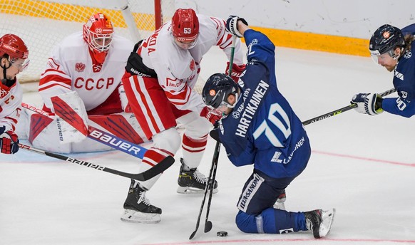 Eishockey, Channel One Cup, Russland - Finnland Russia Ice hockey, Eishockey Euro Tour Russia - Finland 6725306 19.12.2021 From left, Russia s Sergei Plotnikov, Russia s Ivan Fedotov, Russia s Alexei  ...