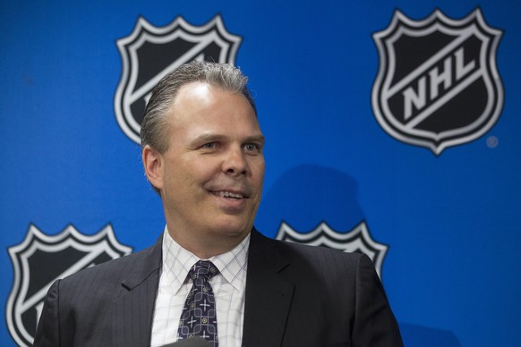 Kevin Cheveldayoff, general manager of Winnipeg Jets, speaks to members of the media after winning the second selection of the NHL hockey draft lottery in Toronto, Saturday, April 30, 2016. (Chris You ...