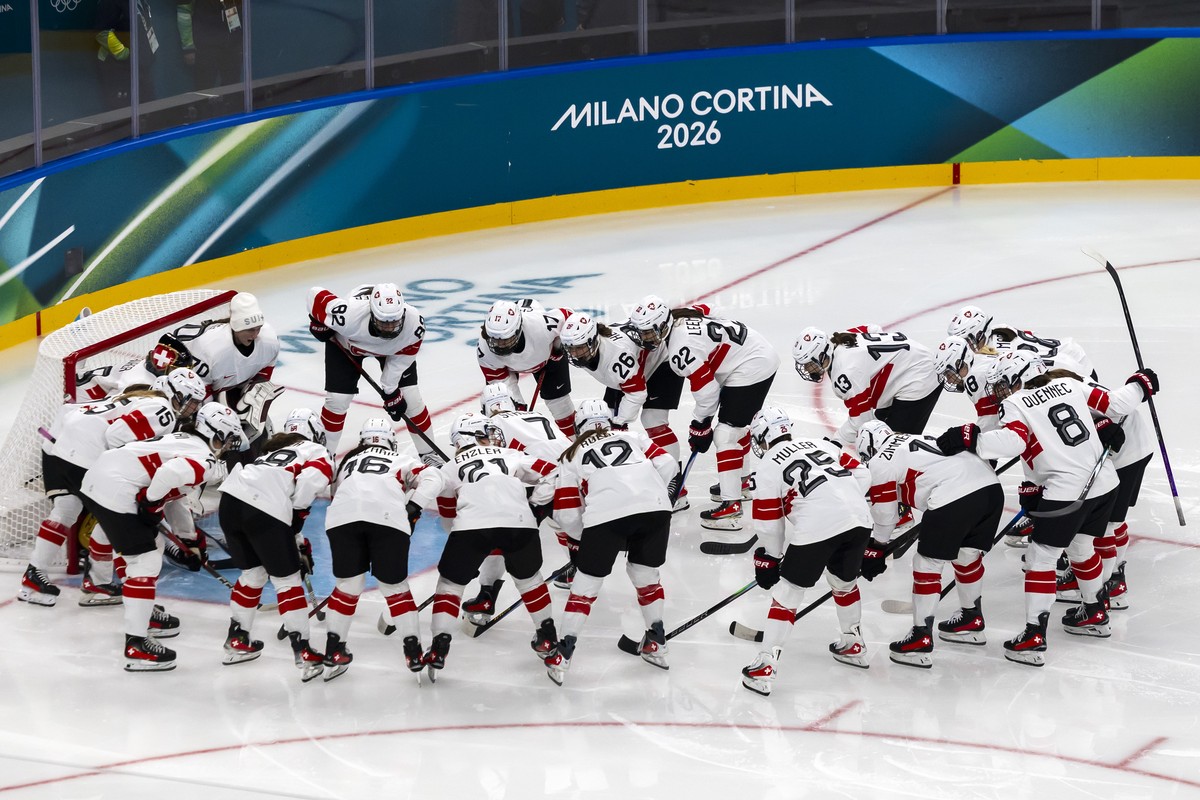 Switzerland's players huddle, prior to the women's group A preliminary round game between Switzerland and the Czech Republic at the 2026 Olympic Winter Games in Milan, Italy, on Friday, Febr ...