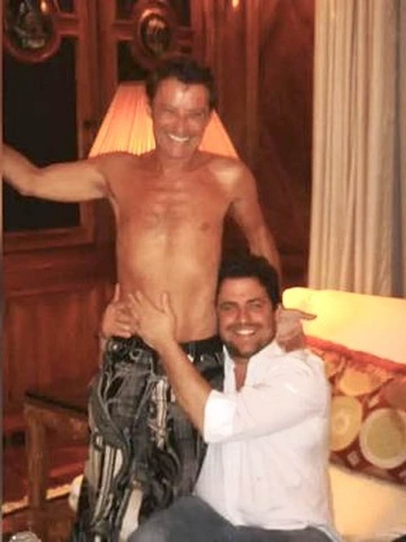 Brett Ratner (sitzend) und Jean-Luc Brunel.