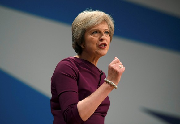 Britain&#039;s Prime Minister Theresa May gives her speech on the final day of the annual Conservative Party Conference in Birmingham, Britain, October 5, 2016. REUTERS/Toby Melville/File Photo