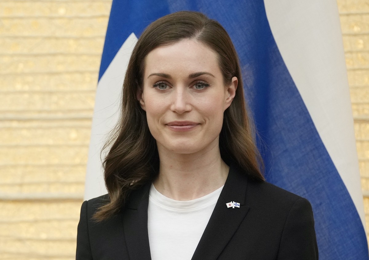 epa09939756 Finland's Prime Minister Sanna Marin attends a signing ceremony at Japan?s Prime Minister (not pictured) official residence in Tokyo, Japan, 11 May 2022. Both parties signed a working ...