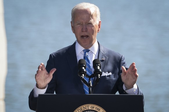 epa09536877 US President Joe Biden delivers remarks during the 10th Anniversary celebration of the dedication of the Martin Luther King, Jr. Memorial at the Tidal Basin in Washington, DC, USA, 21 Octo ...