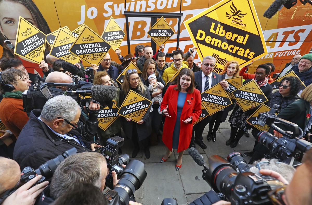 Britain's Liberal Democrat leader Jo Swinson, center, on the election campaign trail in North London, Wednesday Nov. 6, 2019. Britain's three major national political parties wooed weary vot ...