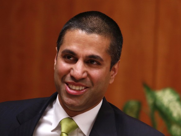 Federal Communications Commission (FCC) commissioner Ajit Pai arrives at a FCC Net Neutrality hearing in Washington February 26, 2015. The FCC is expected Thursday to approve Chairman Tom Wheeler&#039 ...