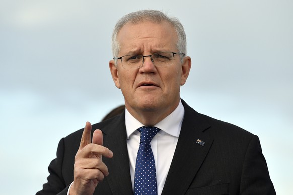 Australia&#039;s Prime Minister Scott Morrison speaks at a housing development near Geelong, Wednesday, May 18, 2022. Morrison would not say who might represent the nation at a summit with U.S., India ...