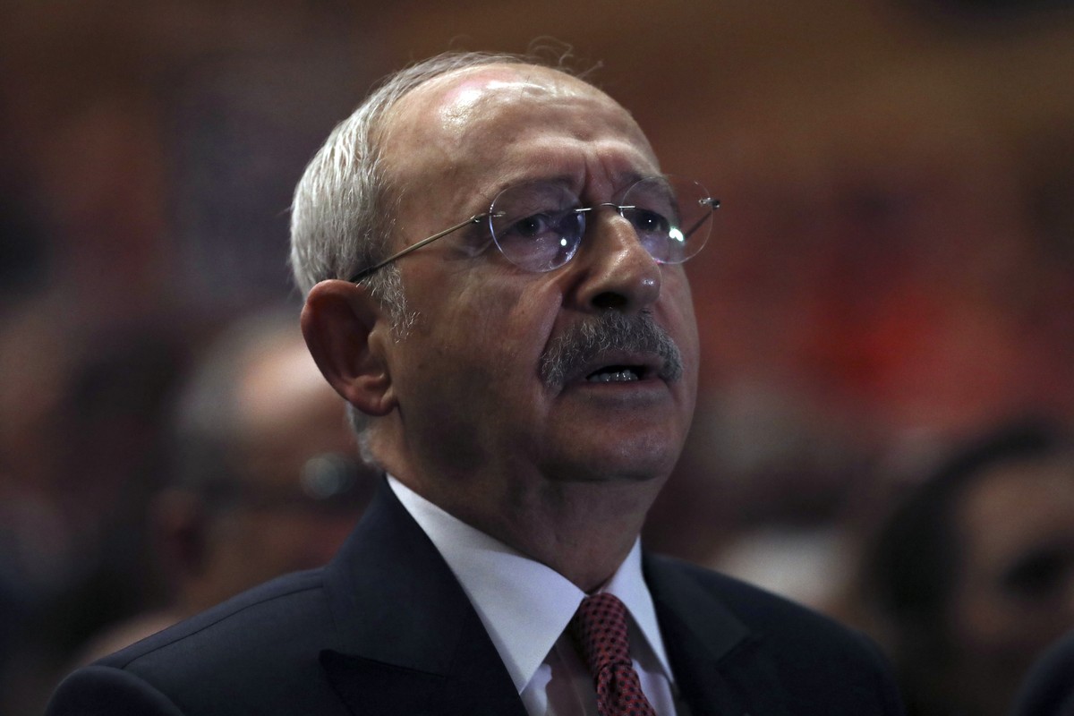 Turkey's main opposition leader Kemal Kilicdaroglu sings the national anthem as six opposition parties present their joint 240-page program for a post-victory Turkey, in Ankara, Turkey, Monday, J ...