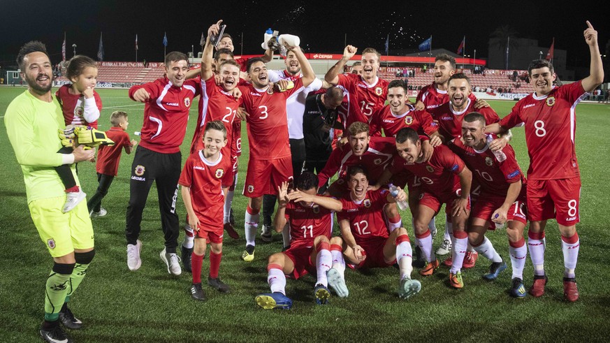 Gibraltar players celebrate at the end of the UEFA Nations League soccer match between Gibraltar and Liechtenstein at the Victoria Stadium in Gibraltar, Tuesday Oct. 16, 2018. Gibraltar beat Liechtens ...