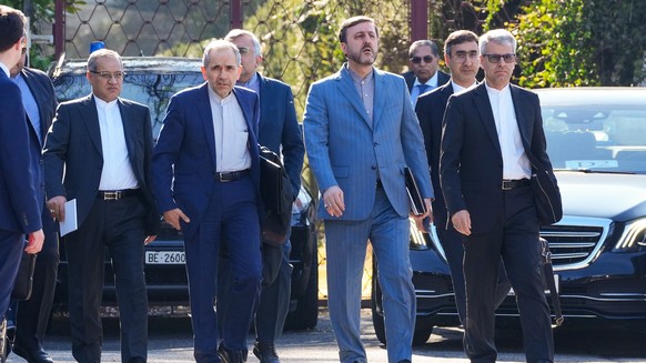 epa12778379 A handout photo made available by the Iranian Foreign Ministry shows members of the Iranian delegation as US-Iran nuclear talks resume in Geneva, Switzerland, 26 February 2026. EPA/IRANIAN ...