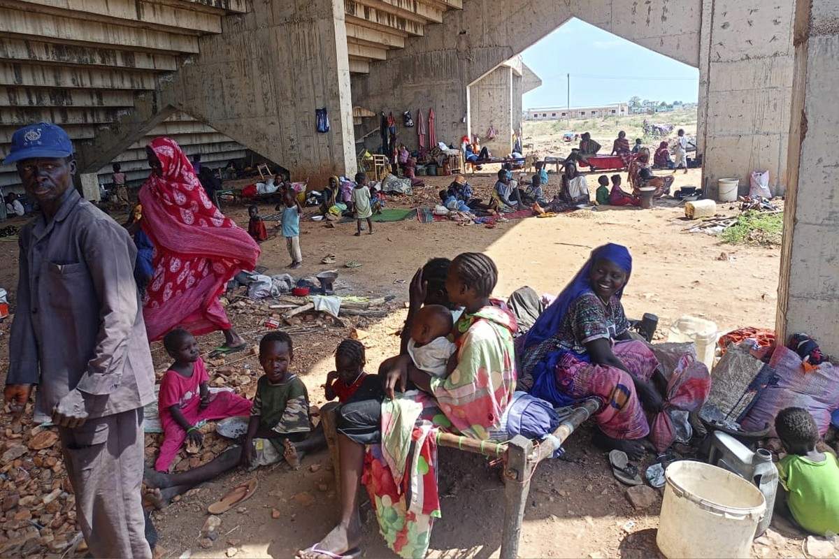 In this photo released by the NGO Mercy Corps, Sudanese families displaced by RSF attacks in Kordofan take shelter in a football stadium in Kadugli, South Kordofan province, Sudan, May 27, 2025. (Merc ...