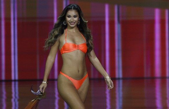 epa12536709 Miss Switzerland Naima Acosta wears a swimsuit during the 74th Miss Universe 2025 preliminary competition at Impact Challenger Hall in Nonthaburi province, on the outskirts of Bangkok, Tha ...