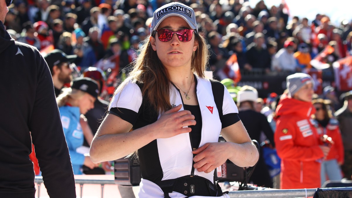 Italy's Sofia Goggia stands at the finish area after completing a women's World Cup downhill, in Crans Montana, Switzerland, Saturday, Feb. 23, 2019. (AP Photo/Alessandro Trovati)