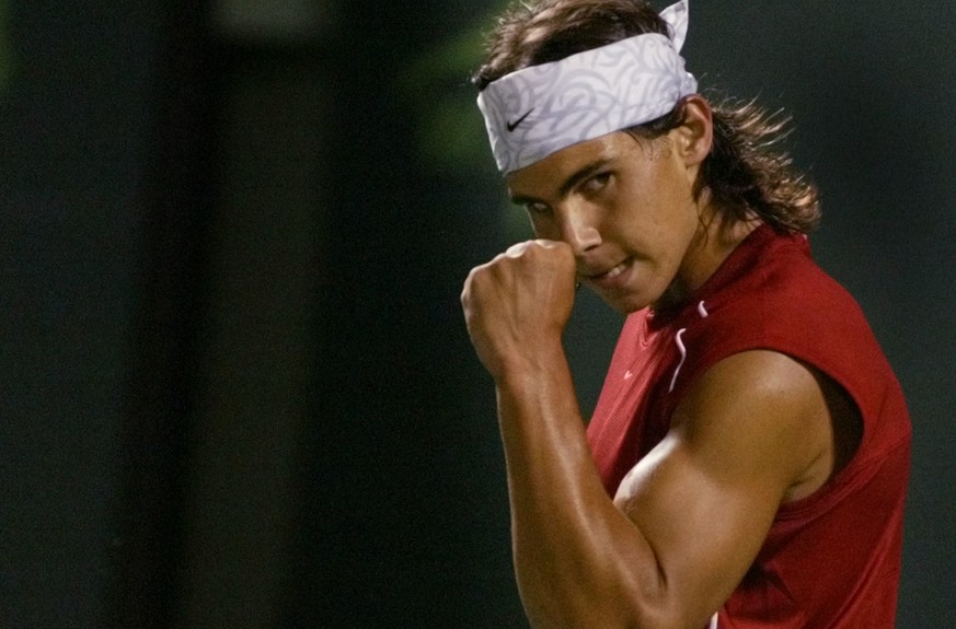 Rafael Nadal of Spain celebrates after winning a point against Roger Federer of Switzerland Sunday, March 28, 2004, at the Nasdaq-100 Open in Key Biscayne, Fla. Thirty-second seeded Nadal went on to d ...