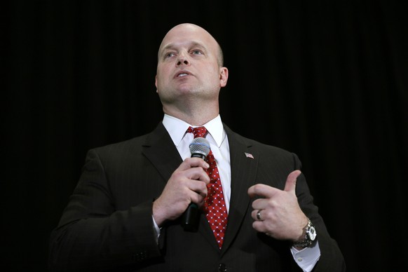 FILE - In this April 11, 2014, file photo, Iowa Senate candidate Matt Whitaker speaks during the Iowa Republican Party&#039;s annual Lincoln Day dinner in Cedar Rapids, Iowa. A GOP TV spot comparing c ...