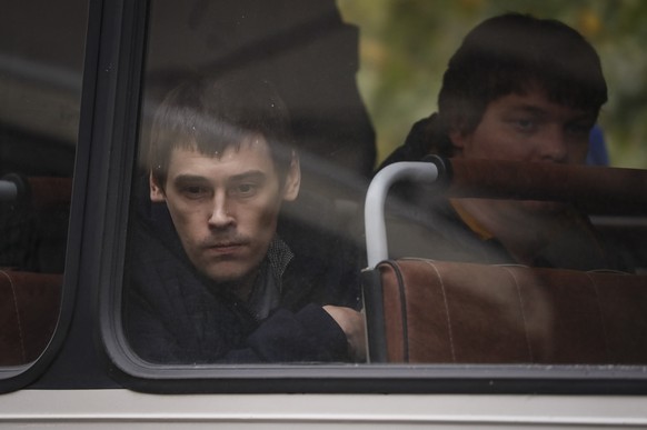 epa10211769 Russian conscripted men in a bus before being sent to a military unit from a recruiting office during Russia's partial military mobilization in Moscow, Russia, 27 September 2022. Russian P ...