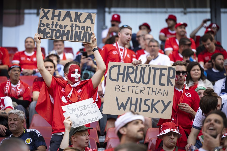 Swiss fans celebrate before during a Group A match between Scotland and Switzerland at the Euro 2024 soccer tournament in Cologne, Germany, Wednesday, June 19, 2024. (KEYSTONE/Peter Klaunzer)