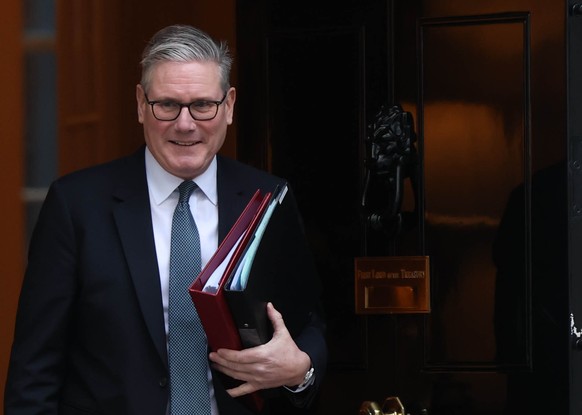 epa12633669 Britains Prime Minister Keir Starmer departs 10 Downing Street in London, Britain, 07 January 2026. Starmer attends the Prime Ministers Questions session at Parliament every week. EPA/NE ...
