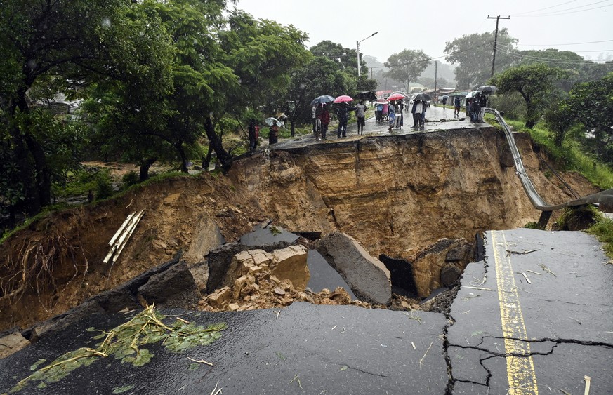 A road connecting the two cities of Blantyre and Lilongwe is seen damaged following heavy rains caused by Tropical Cyclone Freddy in Blantyre, Malawi Tuesday, March 14 2023. (AP Photo/Thoko Chikondi)