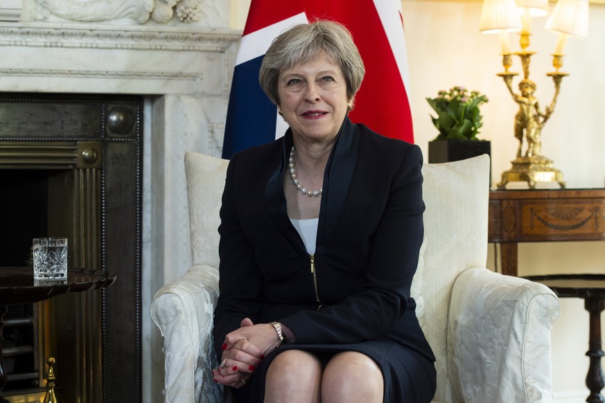 epa07037143 (FILE) British Prime Minister Theresa May, during a meeting with Prime Minister of Belgium Charles Michel, inside No10 Downing Street in Central London, Britain, 23 May 2018 (reissued 21 S ...