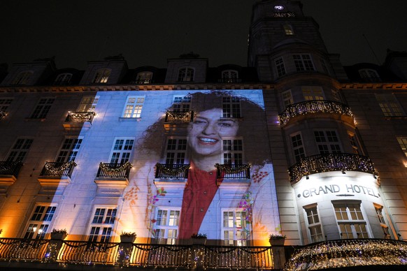 epa11021738 Picture of the 2023 Nobel Peace Prize winner Narges Mohammadi on the wall of the Grand Hotel before the Nobel banquet in Oslo after the Nobel Peace Prize 2023 ceremony in Oslo, Norway, 10  ...