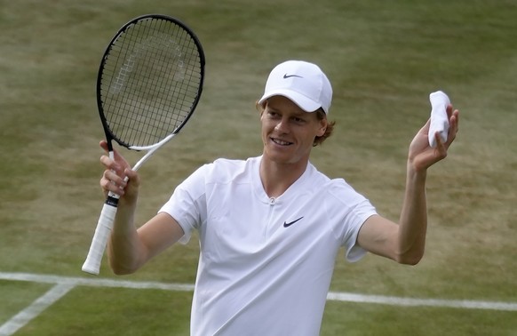 Italy&#039;s Jannik Sinner celebrates after beating John Isner of the US in their men&#039;s singles third round match on day five of the Wimbledon tennis championships in London, Friday, July 1, 2022 ...