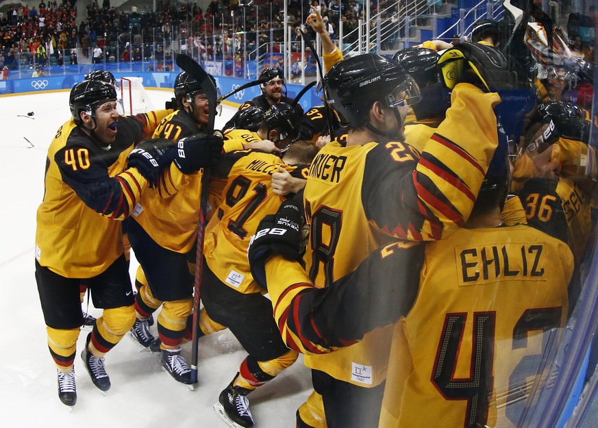 epaselect Players of Germany celebrate after winning the Men&#039;s Ice Hockey semi final match between Germany and Canada at the Gangneung Hockey Centre during the PyeongChang 2018 Winter Olympic Gam ...