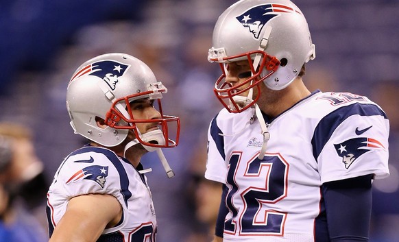 INDIANAPOLIS, IN - NOVEMBER 16: Danny Amendola #80 of the New England Patriots and teammate Tom Brady #12 talk before taking on the Indianapolis Colts at Lucas Oil Stadium on November 16, 2014 in Indi ...