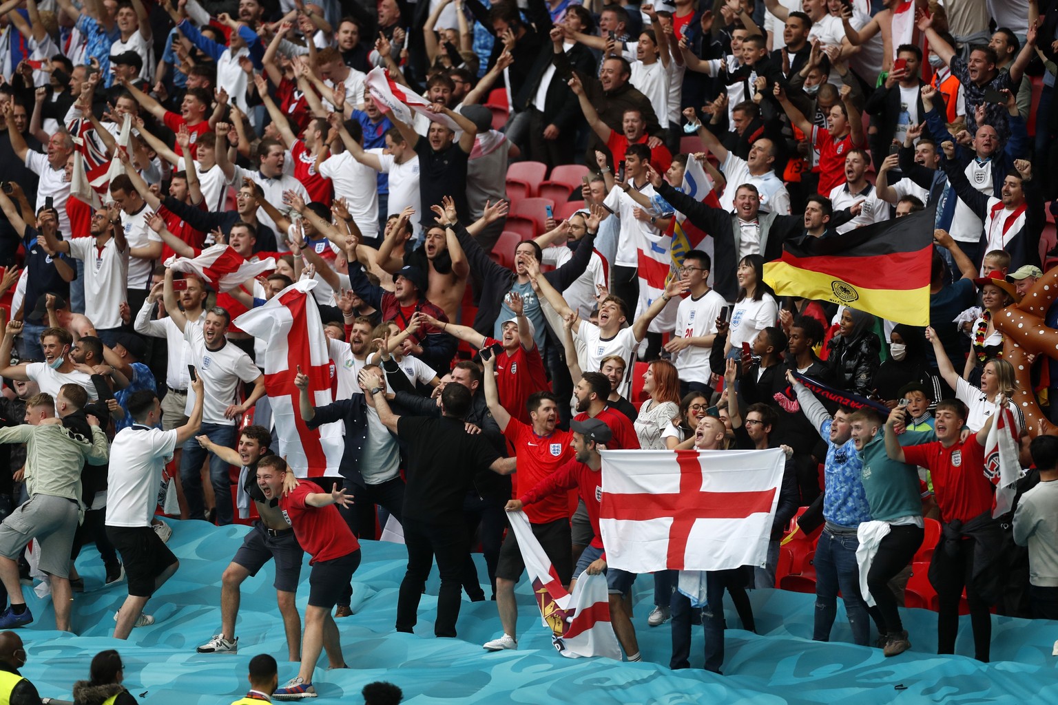 England fans cheer for their national team after the Euro 2020 soccer championship round of 16 match between England and Germany, at Wembley stadium, in London, Tuesday, June 29, 2021. England won 2-0 ...