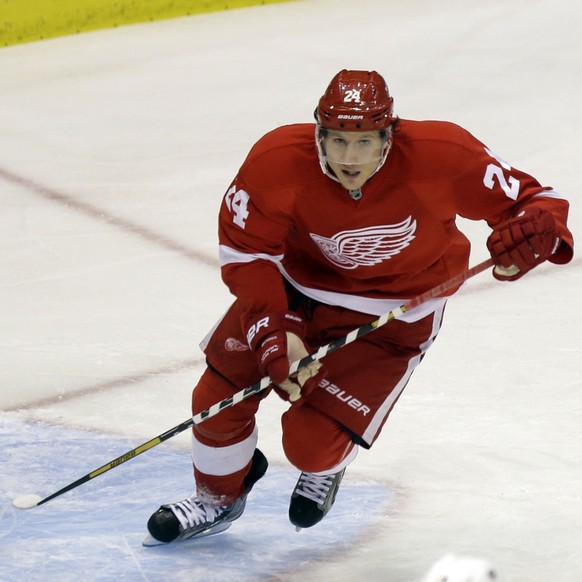 Detroit Red Wings center Damien Brunner (24) of Switzerland skates in the crease during the third period of an NHL hockey game against the Columbus Blue Jackets in Detroit, Thursday, Feb. 21, 2013. (A ...