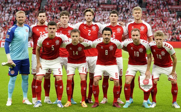 epa10254006 Players of Denmark line up for the UEFA Nations League soccer match between Denmark and Croatia in Copenhagen, Denmark, 10 June 2022. Back from L: Goalkeeper Kasper Schmeichel, Pierre-Emil ...