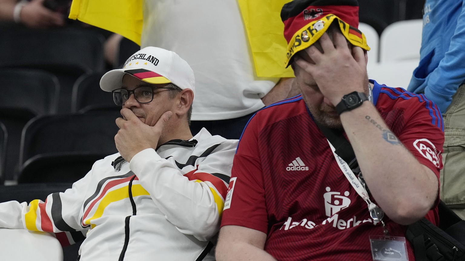 German soccer supporters reacts after the World Cup group E soccer match between Costa Rica and Germany at the Al Bayt Stadium in Al Khor , Qatar, Friday, Dec. 2, 2022. (AP Photo/Martin Meissner)