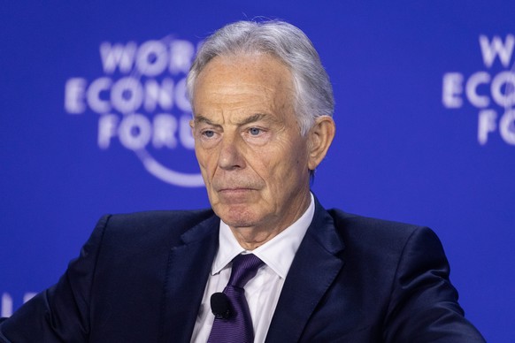 epa12194079 Sir Tony Blair, former Prime Minister of the United Kingdom and Executive Chairman of the Tony Blair Institute for Global Change, participates in a session at the World Economic Forum Annu ...