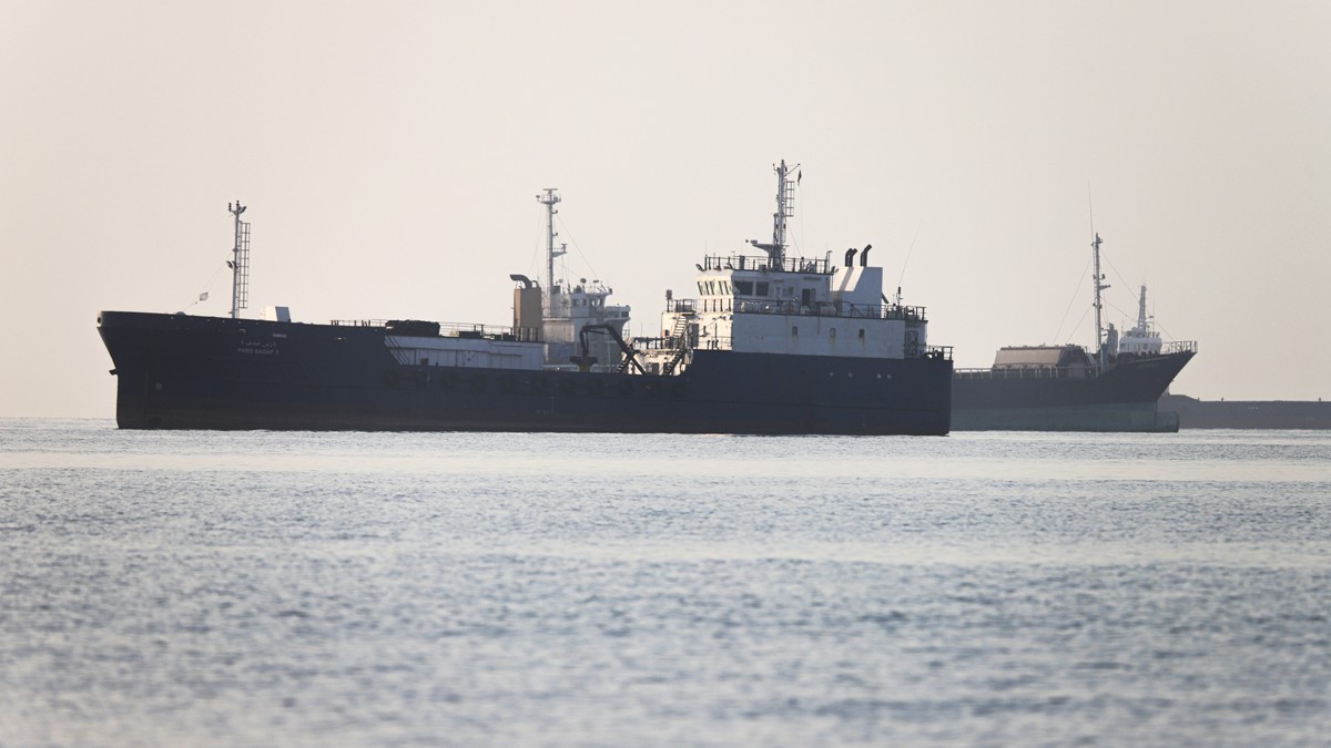 epa13009260 A handout photo made available by Isna News Agency shows cargo ships stuck in the Strait of Hormuz, along the coast of Bandar Abbas, in southern Iran, 01 June 2026. According to Iranian st ...