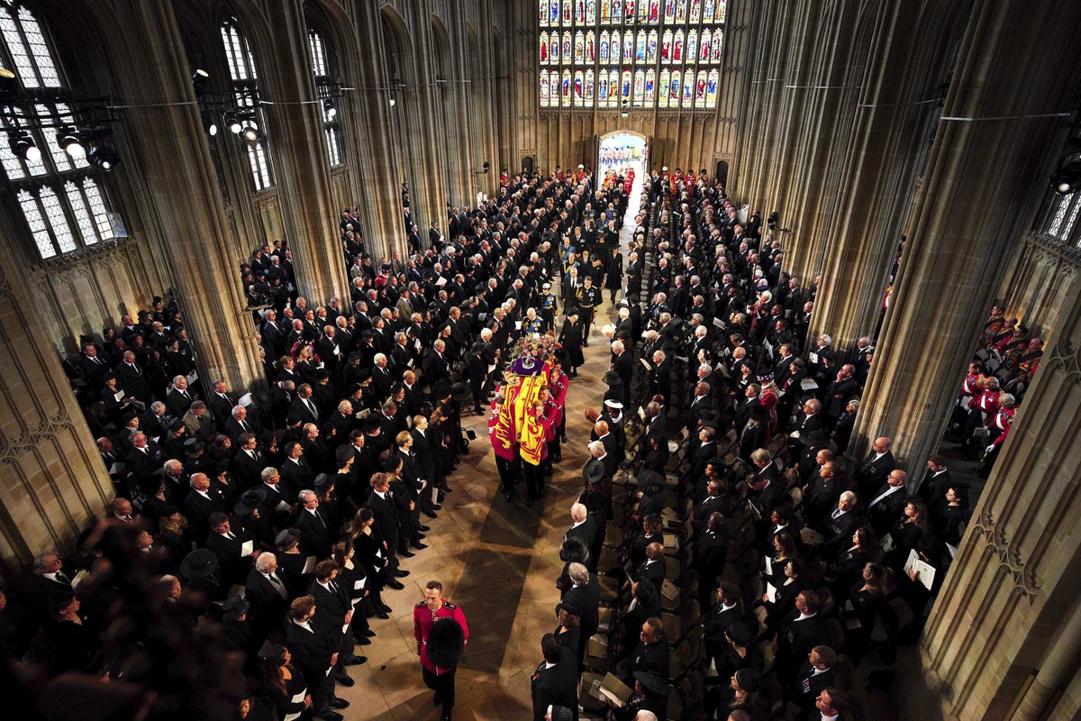 Members of the royal family follow the coffin during the Committal Service for Queen Elizabeth II at St George's Chapel, at Windsor Castle, Windsor, England, Monday Sept. 19, 2022. The Queen, who ...
