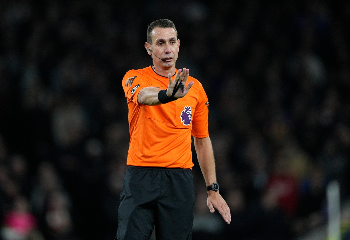 FILE - Referee David Coote reacts during the English Premier League soccer match between Tottenham Hotspur and Brighton and Brentford, at White Hart Lane Stadium in London, England, Wednesday, Jan. 31 ...