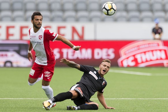 Thuns Matteo Tosetti, links, kaempft um dem Ball mit Sions Federico Dimarco, rechts, im Fussball Meisterschaftsspiel der Super League zwischen dem FC Thun und dem FC Sion, am Sonntag, 23. Juli 2017, i ...