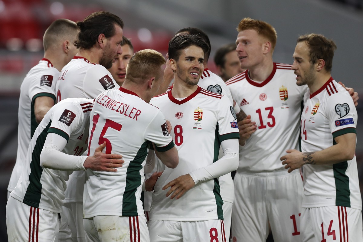 Hungary players celebrates after Hungary's Roland Sallai scored his side's opening goal during the World Cup 2022 group I qualifying soccer match between Hungary and Poland at the Puskas Are ...