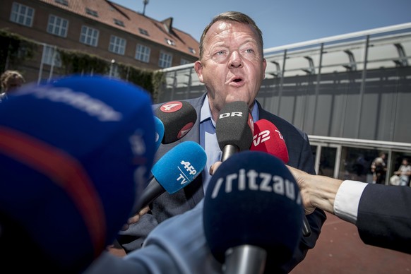 Danish Prime Minister Lars Loekke Rasmussen from the Liberal Party faces the media after casting his vote in Copenhagen, Denmark, Wednesday June 5, 2019, during parliamentary elections. (Mads Claus Ra ...