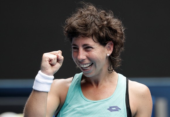 Spain&#039;s Carla Suarez Navarro celebrates after defeating Anett Kontaveit of Estonia in their fourth round match at the Australian Open tennis championships in Melbourne, Australia Sunday, Jan. 21, ...