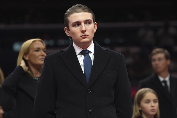 Barron Trump watches as President Donald Trump attends an indoor Presidential Inauguration parade event at Capital One Arena, Monday, Jan. 20, 2025, in Washington. (AP Photo/Evan Vucci)