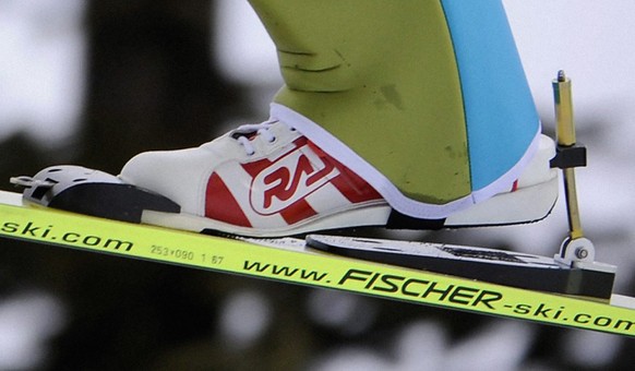 CROPPED IMAGE OF epa02027885 - Swiss Simon Ammann is airborne during the Ski Jumping qualification round at Whistler Olympic Park during 2010 Olympic Games in Whistler, Canada, 12 February 2010. EPA/B ...