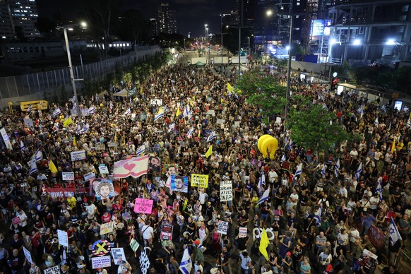 epa12218849 Families of Israeli hostages held by Hamas in Gaza protest outside the Kirya military headquarters in Tel Aviv, Israel , 05 July 2025. According to the Israeli army (IDF) spokesperson, aro ...